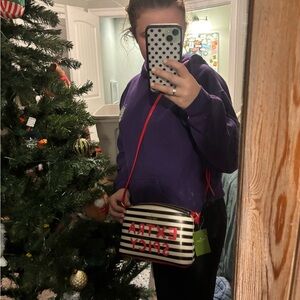 Kate Spade Black and White Striped Crossbody Bag with Red Accents